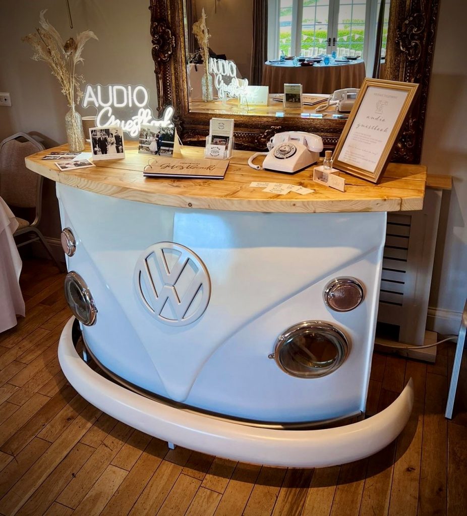 Splitscreen campervan Bar pained in light grey and cream with an oak table top.